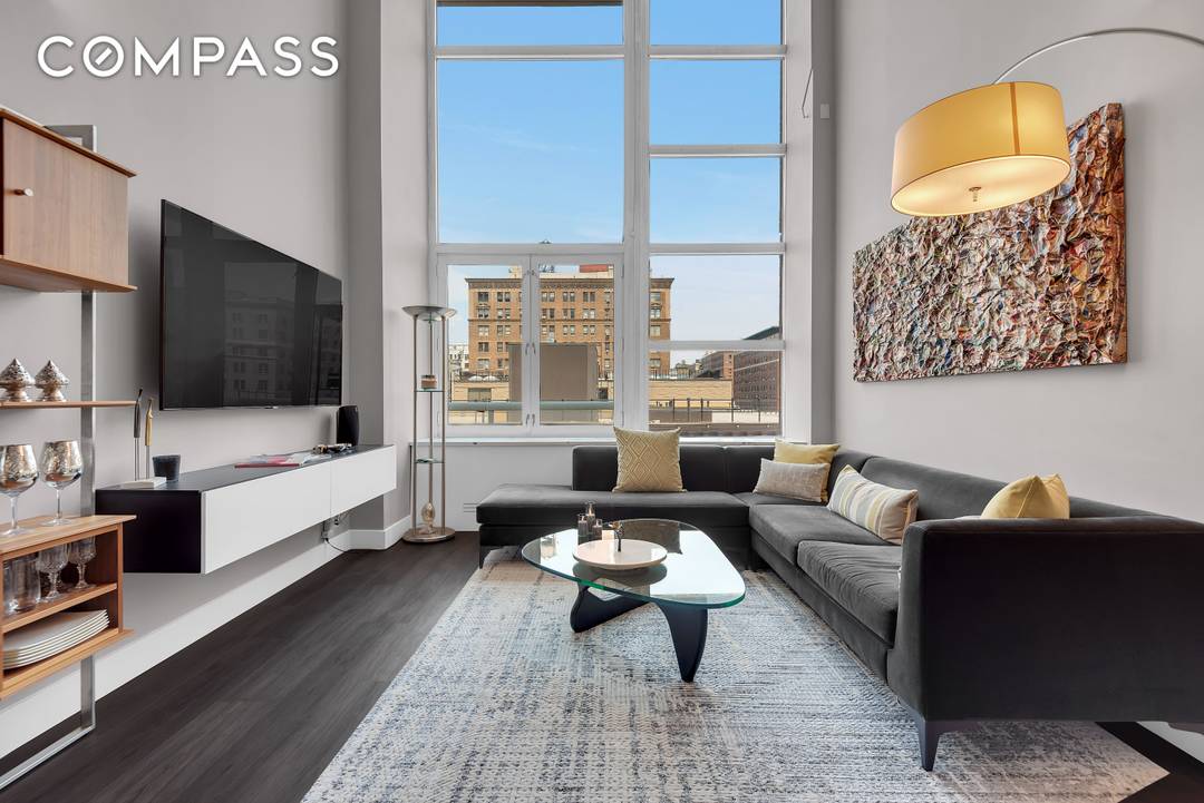 Sleek downtown style meets timeless Upper West Side living in this rare 1 bedroom, 1.