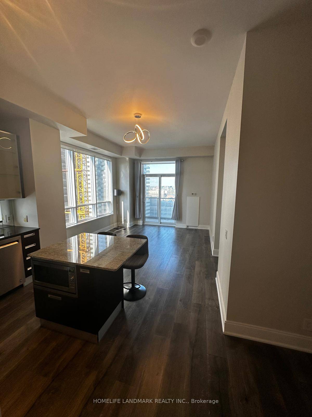 An exquisite corner residence situated in the vibrant heart of Yorkville.