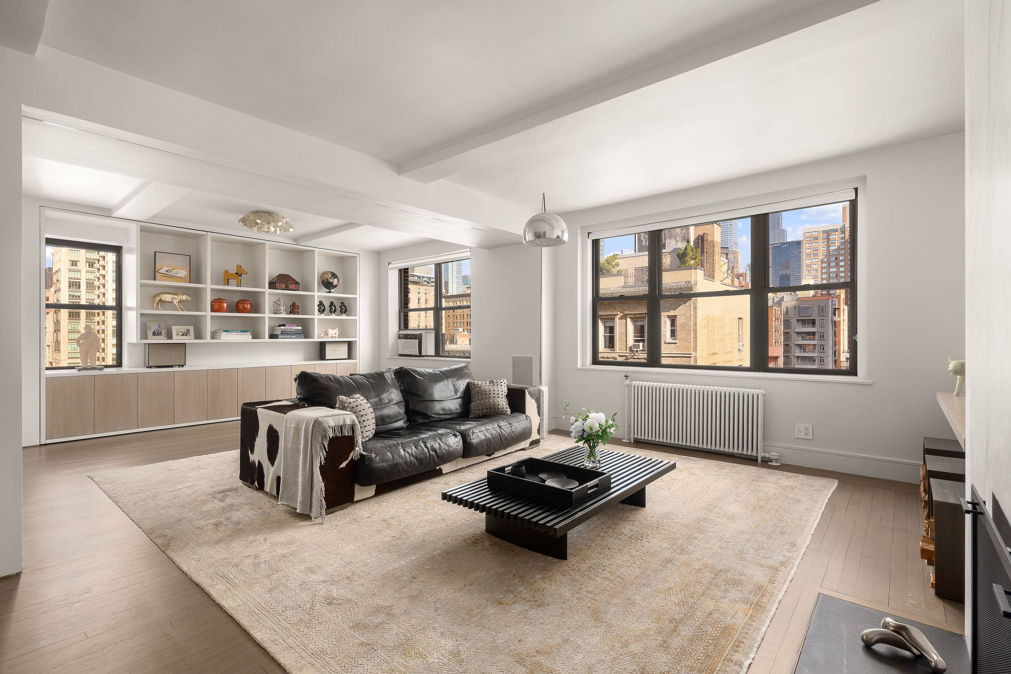 Designer Prewar Two Bedroom Cooperative 1931 Origins with Downtown Aesthetic Details Meticulously renovated to bring a modern twist to classical details, this two bedroom corner apartment boasts windows from three ...