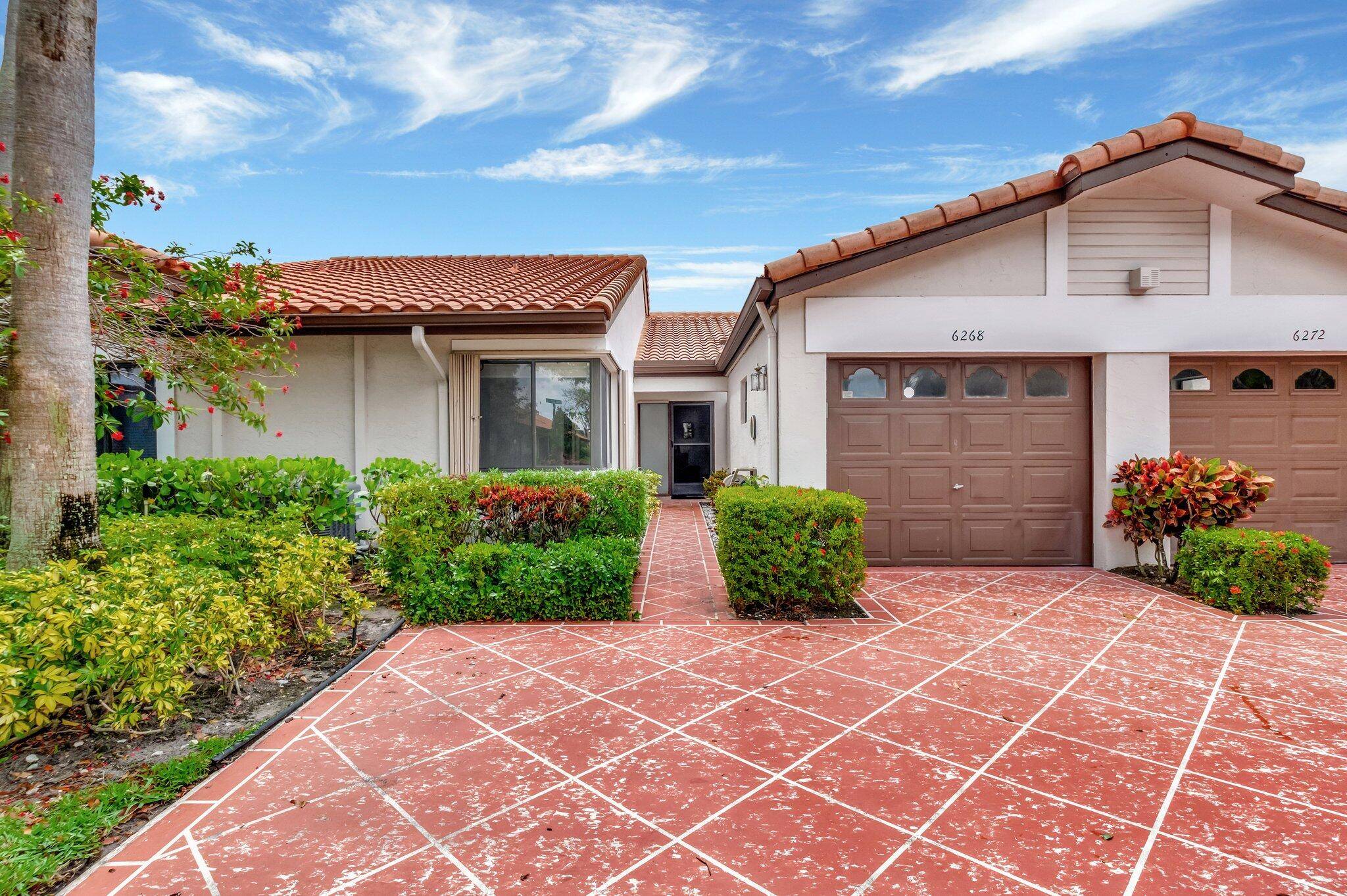 Escape to paradise in this beautifully updated 2 bedroom, 2 bathroom condo located in the sought after Huntington Pointe, a premier 55 gated community in the heart of Delray Beach.