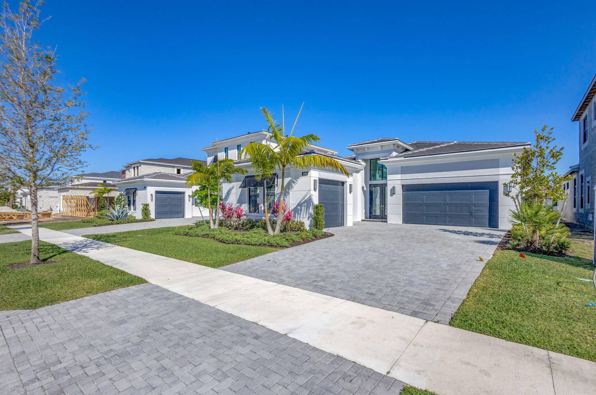 Welcome to 5819 WarsolTerrace, an exceptional Kolterdesigned CBS estate situated within theprestigious gated, resortstyle community of Artistry in Palm Beach Gardens.