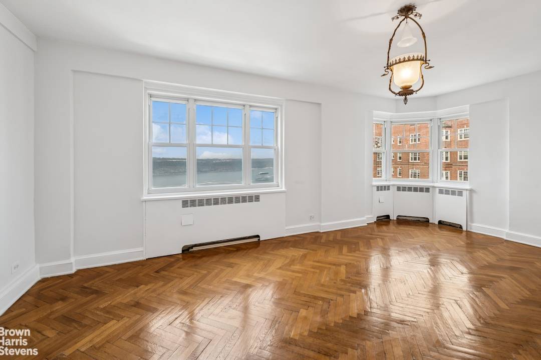 Welcome to your new home at 160 Cabrini Boulevard, Unit 127, nestled in the vibrant and historic neighborhood of Washington Heights.