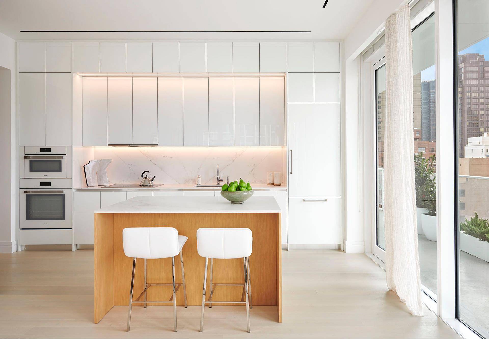 This spacious, corner 1, 416 square foot two bedroom, two and a half bath residence features a deep wraparound terrace overlooking Central Park, and western views of the Midtown skyline.