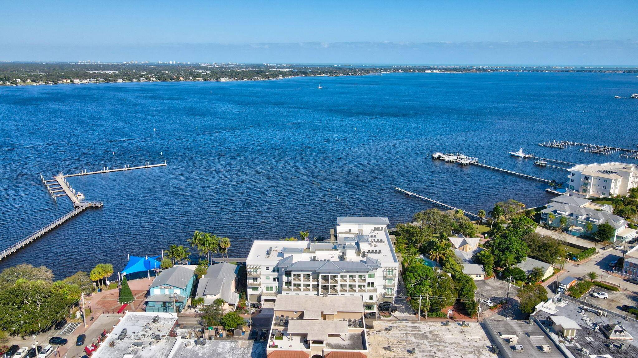 Experience the pinnacle of waterfront living in this newly constructed 2023 condo at Sailfish Cove in Stuart.