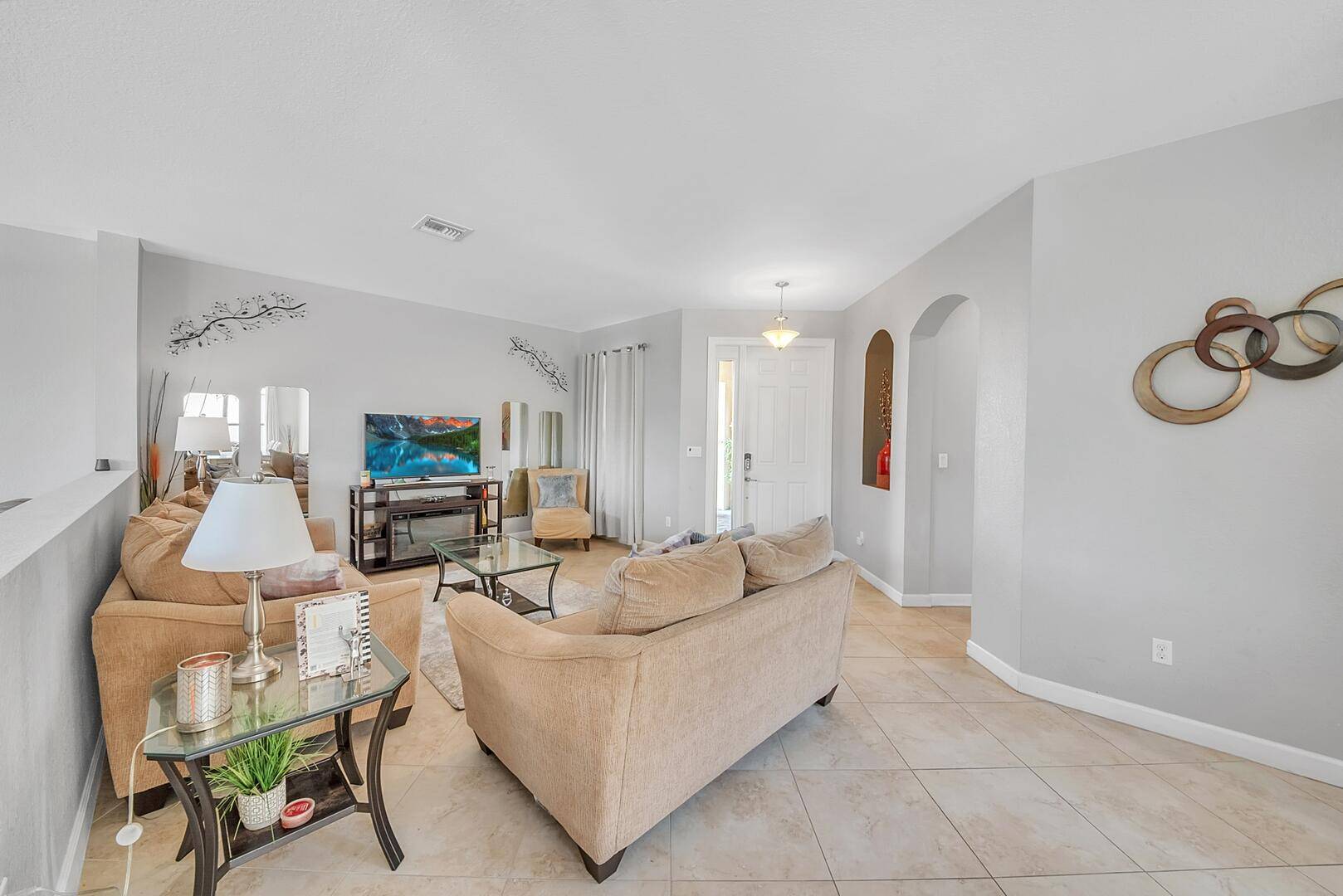 Welcome to your dream home in the highly desirable, gated community of Gulfstream Preserve !