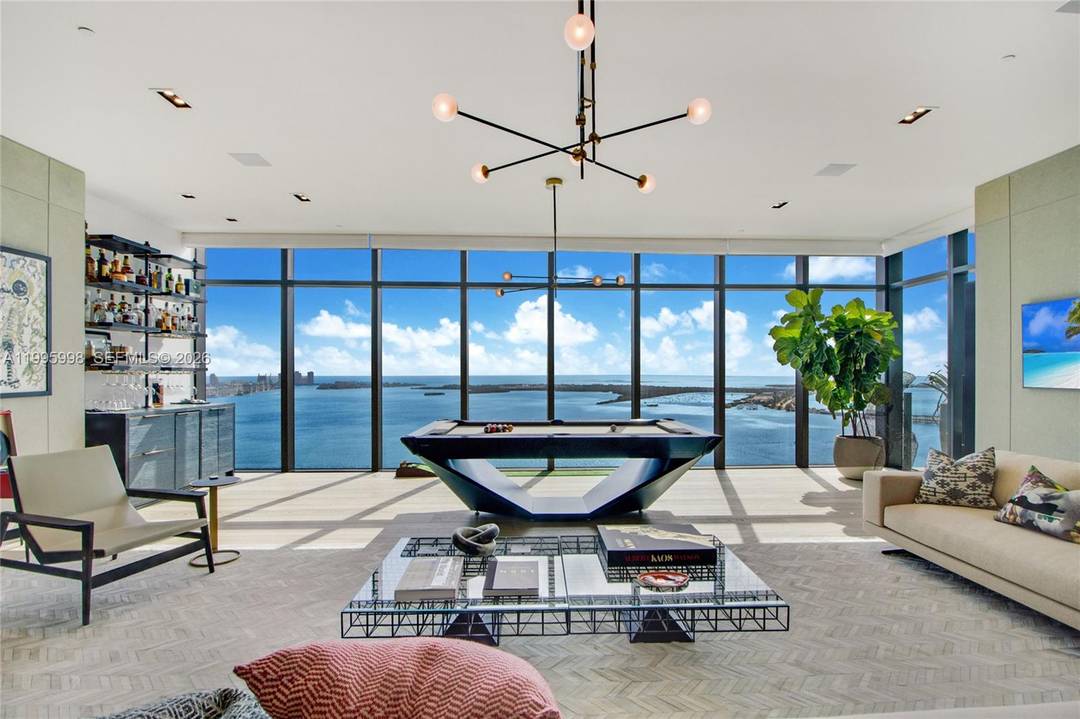 BREATHTAKING, UNOBSTRUCTED WATER VIEWS FROM EVERY ROOM OF UNIT 4301 offering a level of detail and customization rarely found in the building.