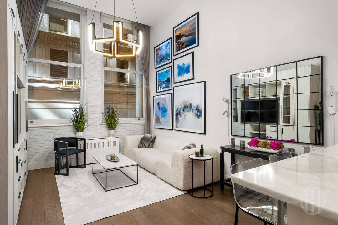 Sophisticated FiDi Living with Designer Upgrades amp ; Premium Amenities Welcome to Apartment 4K at 25 Broad Street a beautifully designed 779 square foot residence blending timeless Italian Renaissance inspired ...