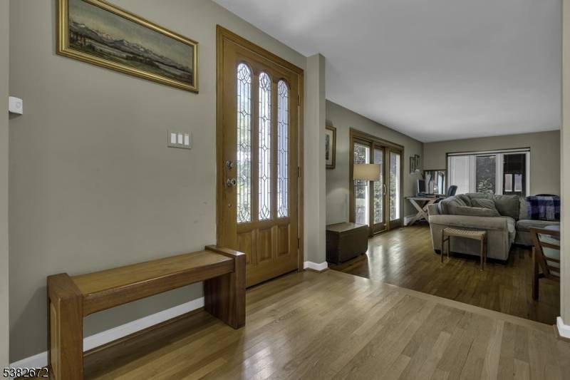 Stunning 4 bedroom 2. 5 bath custom colonial in desirable private lake community of Green Pond.