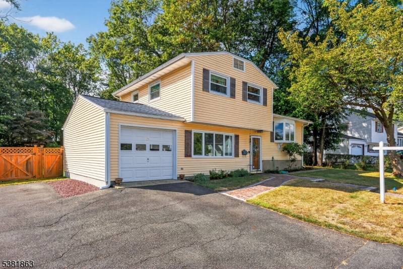 Welcome to this beautifully maintained home nestled on a quiet street, offering 3 bedrooms plus a versatile den perfect for a home office or guest space.