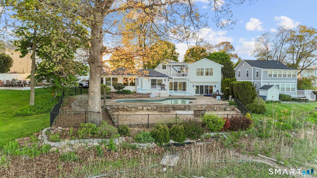 Experience refined coastal living in this exceptional waterfront residence in Branford, where timeless elegance meets the serenity of the shoreline.