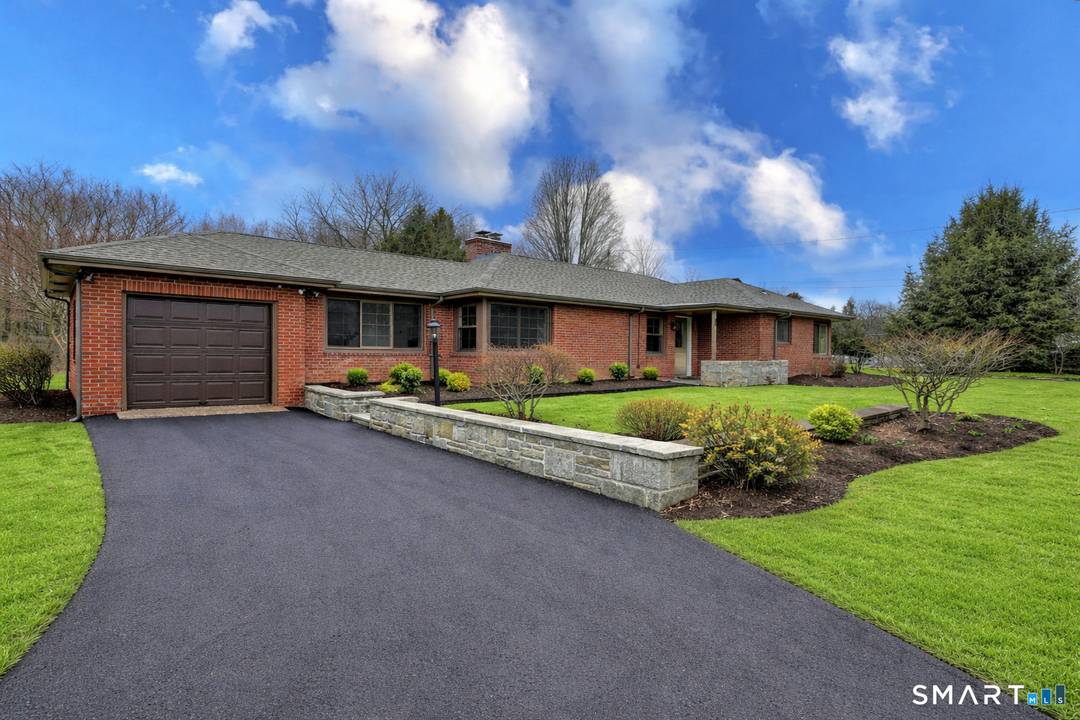 Welcome to 53 Geer Street in Cromwell an exquisite brick ranch that has been completely updated with refined finishes and thoughtful design throughout.