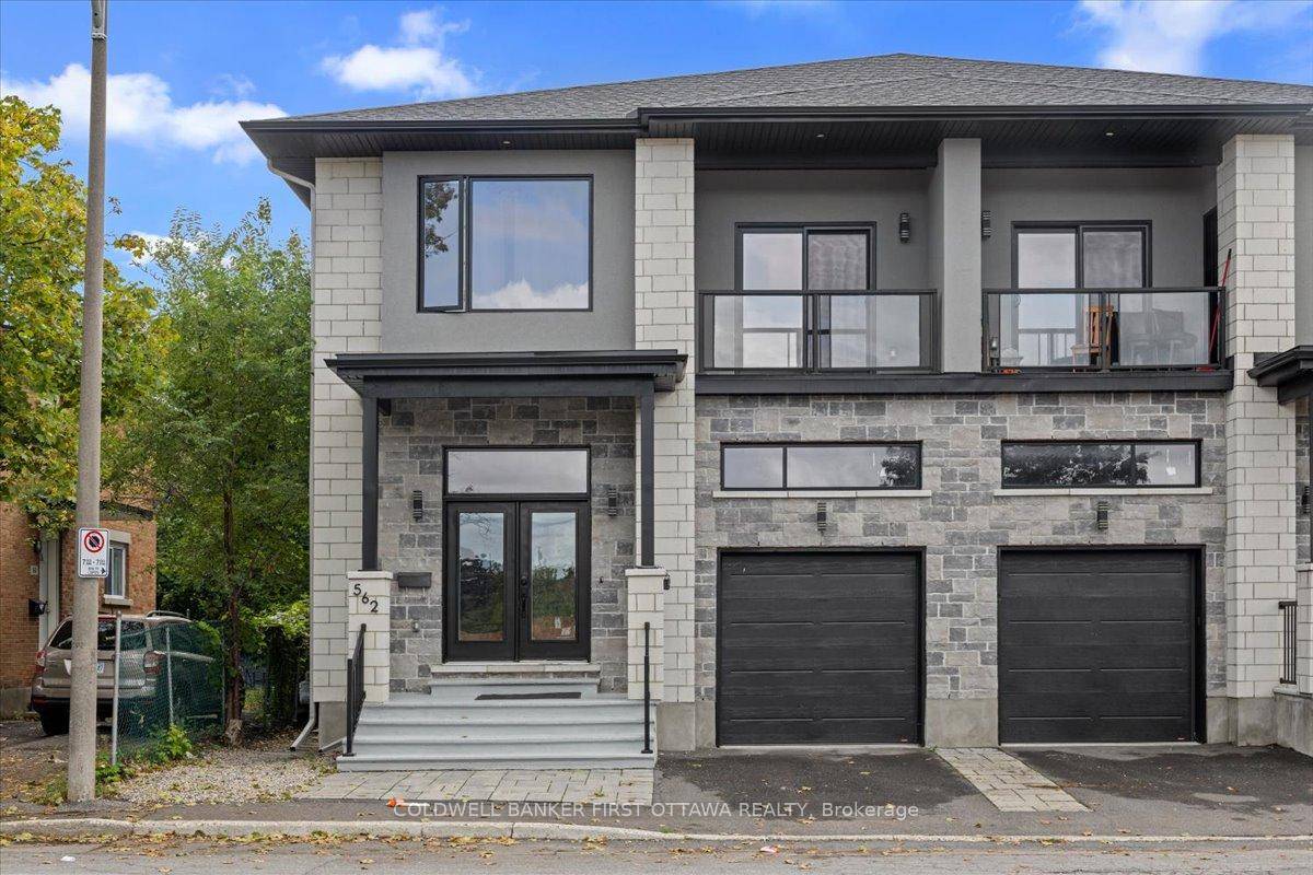 Introducing 562 Queen Mary Street, an extraordinary legal duplex nestled in the prestigious Castle Heights community, offering nearly 65, 000 in annual rental income.