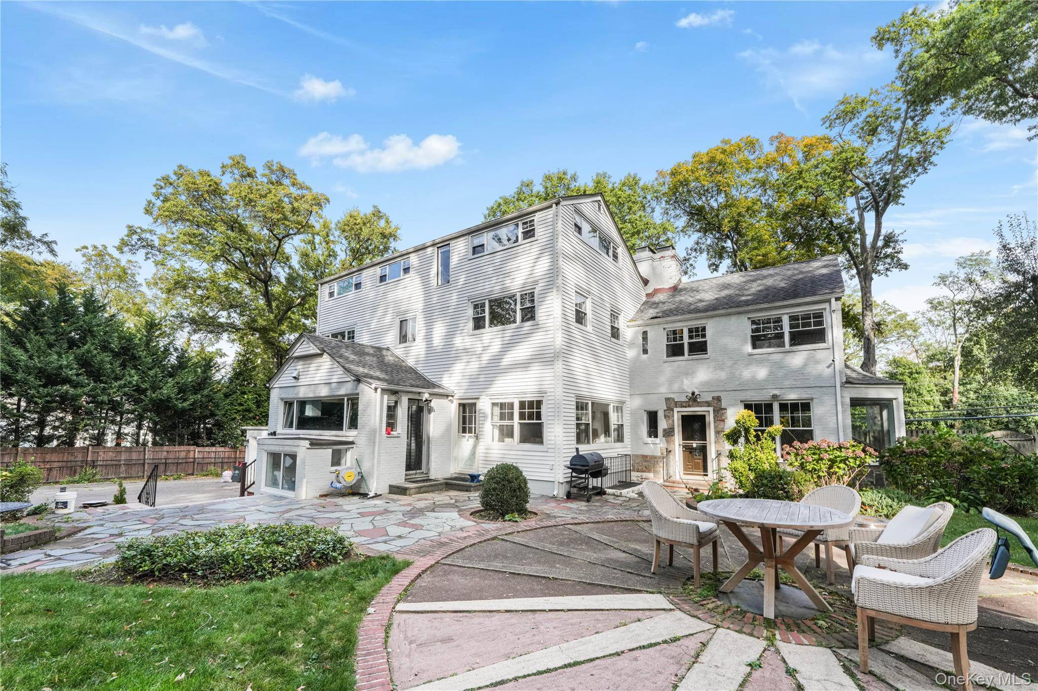 Welcome to this stately colonial residence located in the prestigious Village of Roslyn Estates.