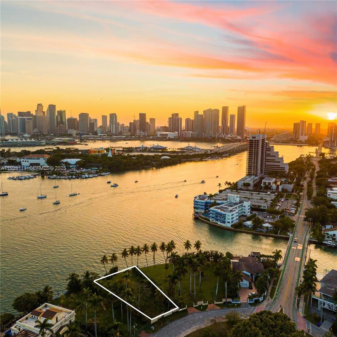 Rare waterfront property featuring over 103 feet of direct frontage on Biscayne Bay with direct downtown sunset views.
