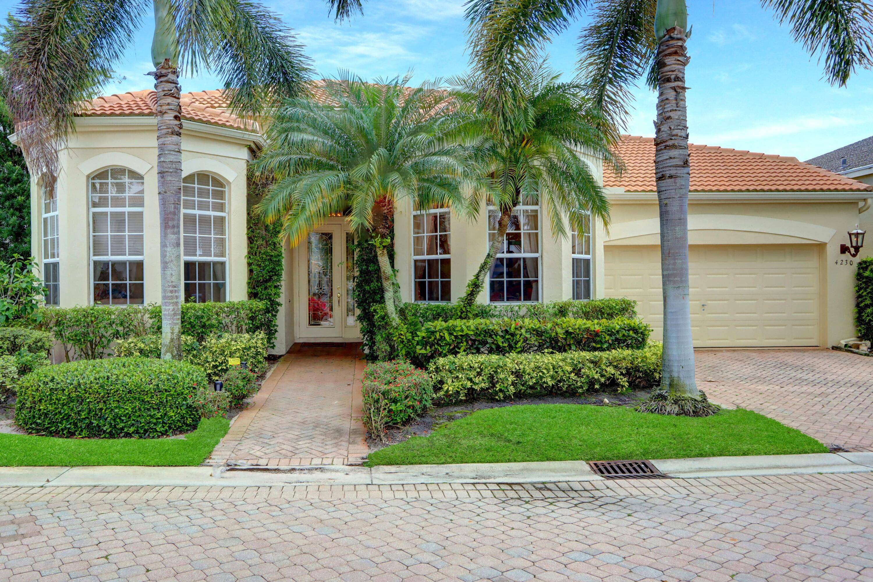 Private setting with a charming patio with a splash pool and no rear neighbors.