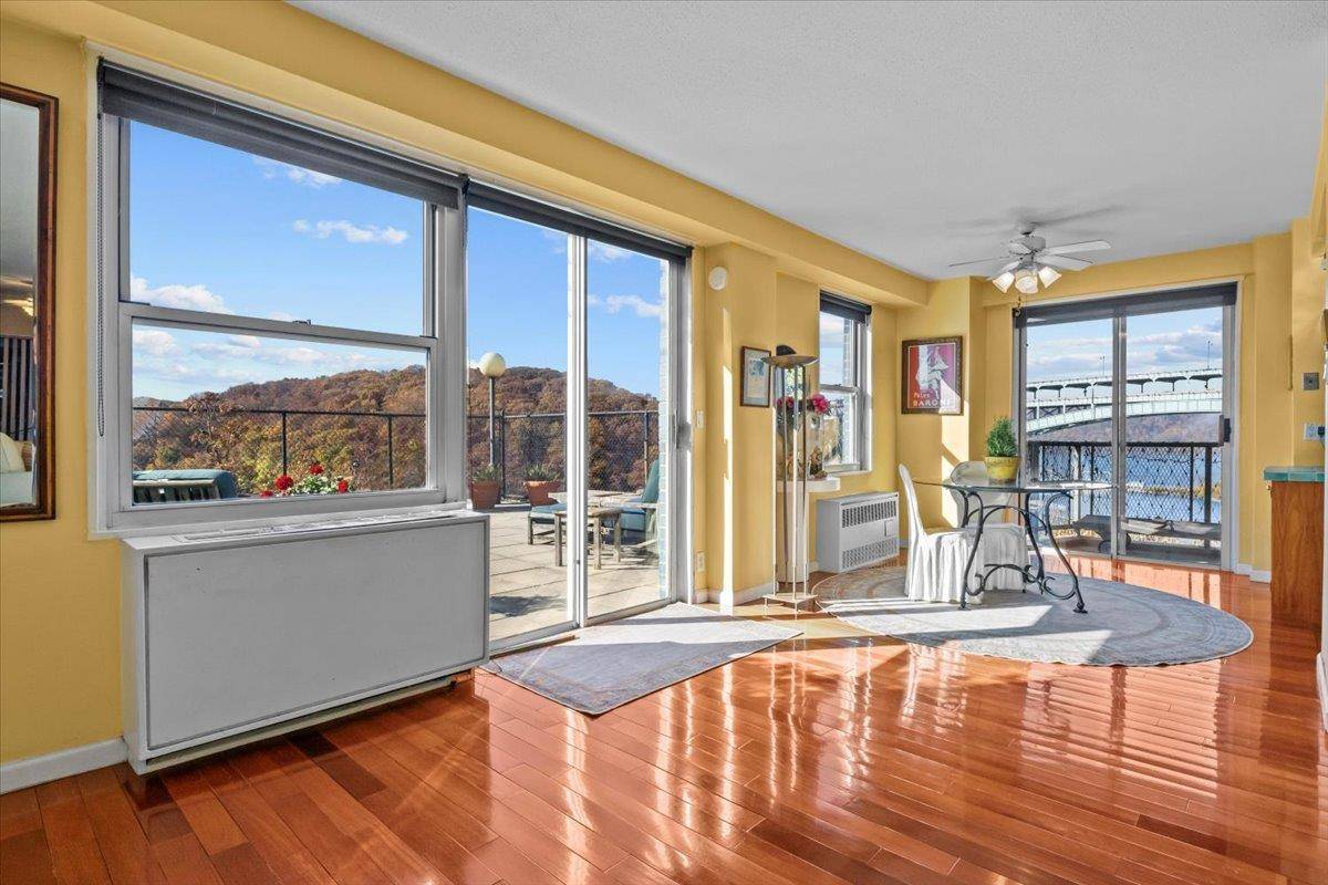 One off the kind 2 bedroom 2 bath apartment with terrace and stunning large patio overlooking the Harlem River and Inwood Park in Spuyten Duyvil section in Riverdale.