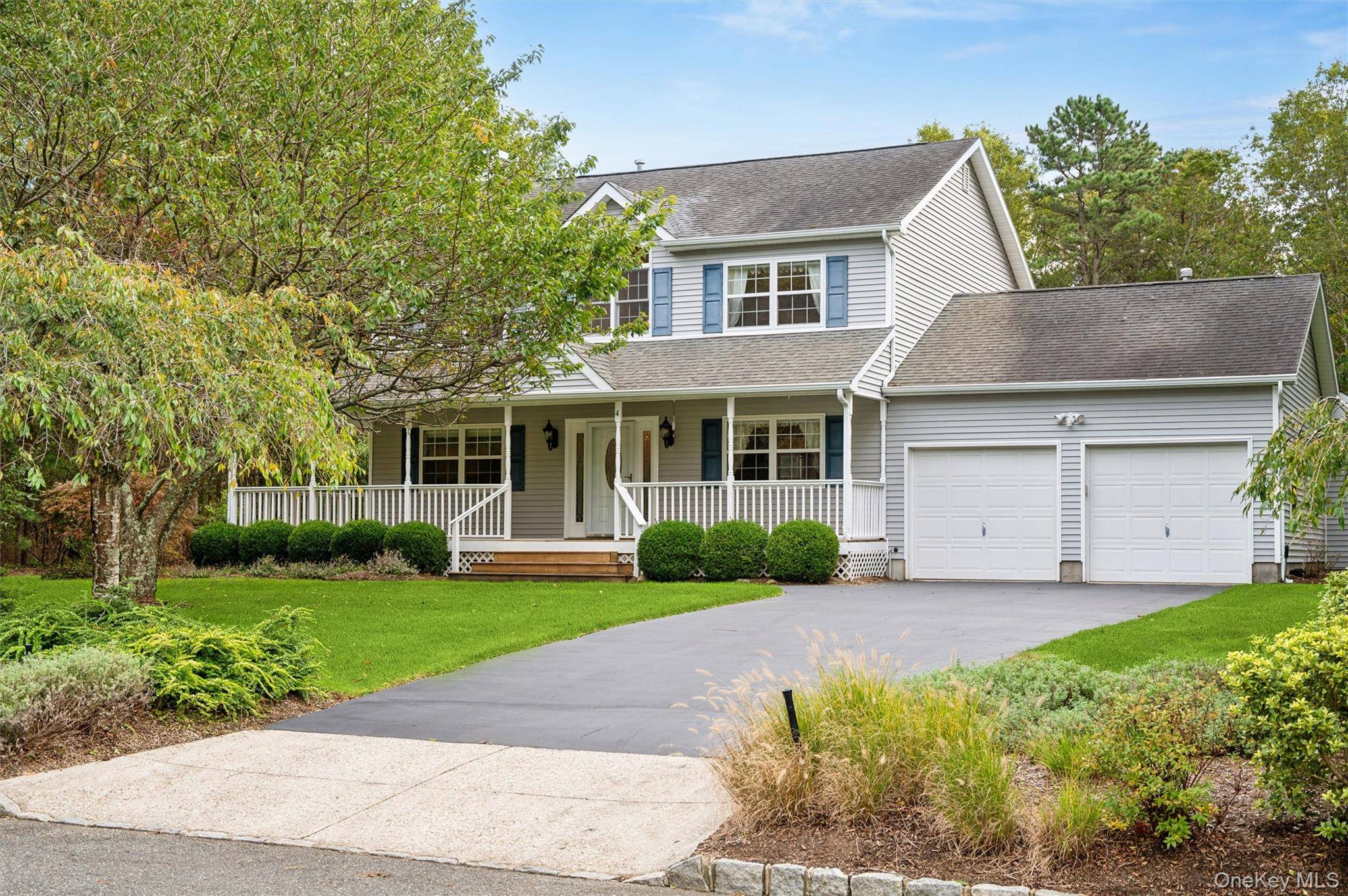 Welcome to 4 Palace Court in Manorville, a beautifully maintained home offering comfort, warmth, and style on a quiet cul de sac.