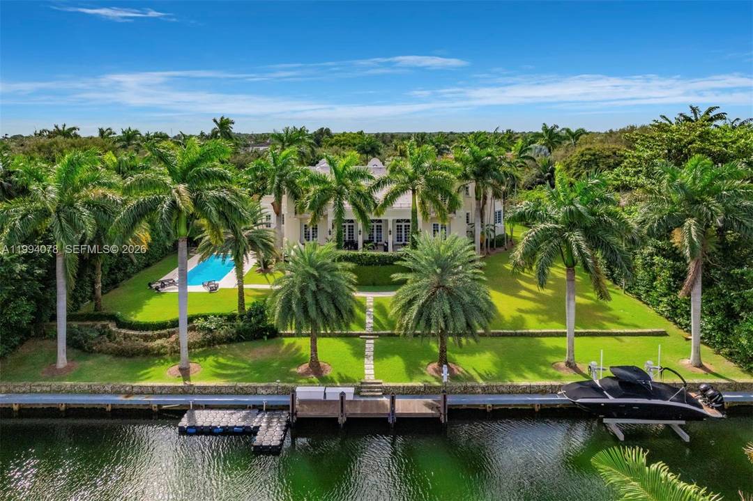 Spectacular waterfront estate in the exclusive, guard gated community of Gables Estates, offering 9, 236 SF under air and 12, 102 total, on beautifully landscaped grounds.