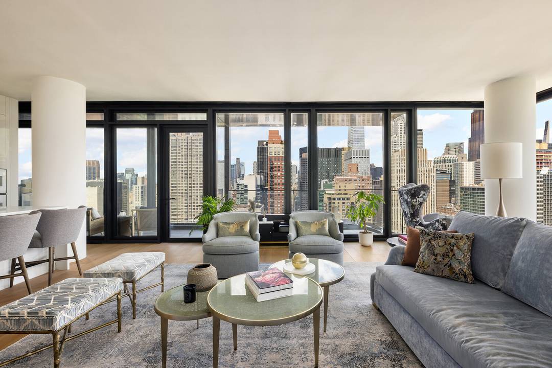 THE ULTIMATE MANHATTAN LUXURY WITH ICONIC SKYLINE amp ; EAST RIVER VIEWS Welcome to this exquisite, high floor 2 bedroom, 2.