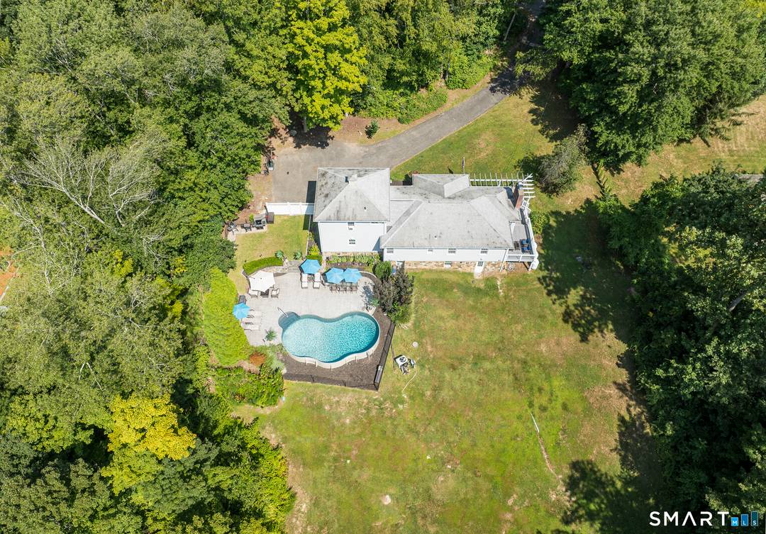 This charming expanded ranch offers far more space and flexibility than meets the eye.