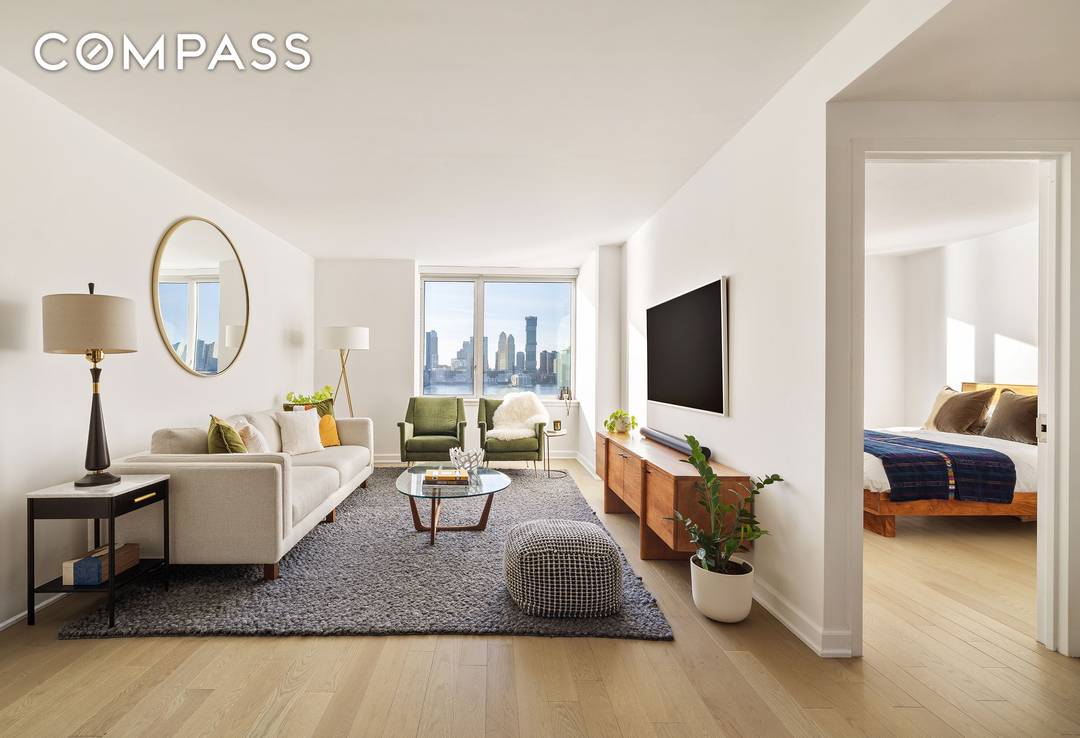 Enjoy waterfront living on the 14th floor with sweeping western Hudson River views and incredible sunsets at the Solaire, a co op with condo rules designed by Pelli Clarke Pelli ...