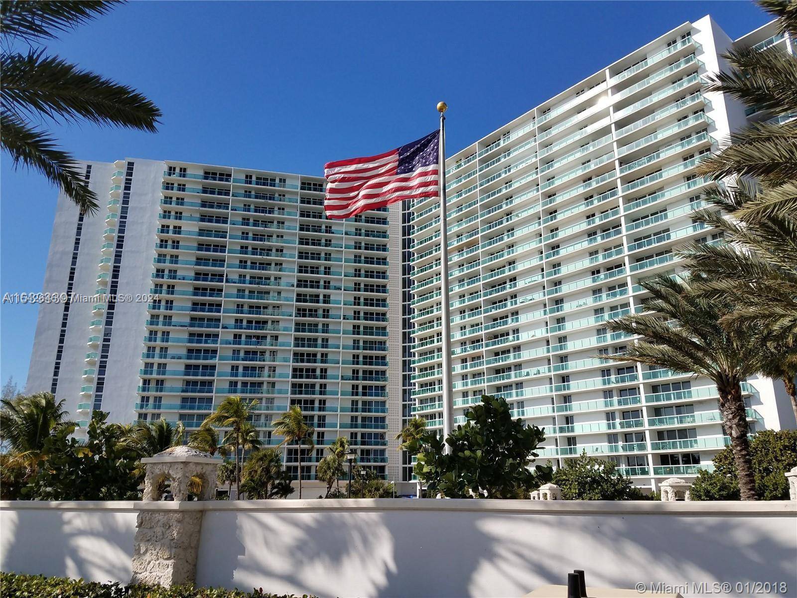 Spacious OVERSIZED 1521 sq ft high floor residence, offering stunning canal and city views in Sunny Isles Beach.
