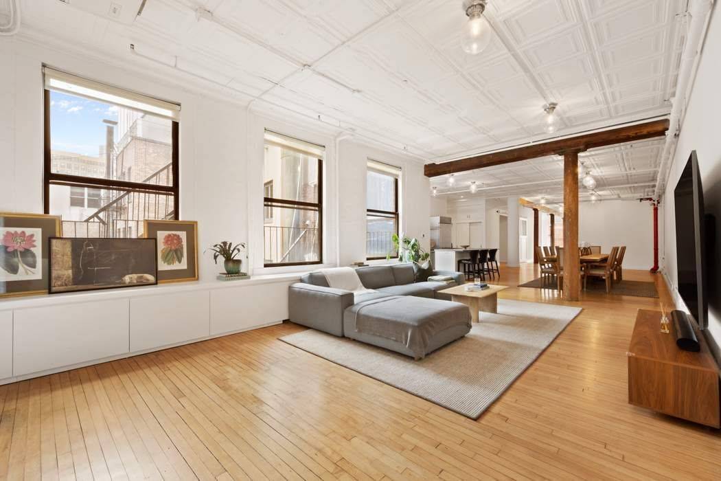 Residence 5B at 5 White Street is a 2, 500 square foot, three bedroom, two bath loft that blends authentic downtown character with modern comfort.
