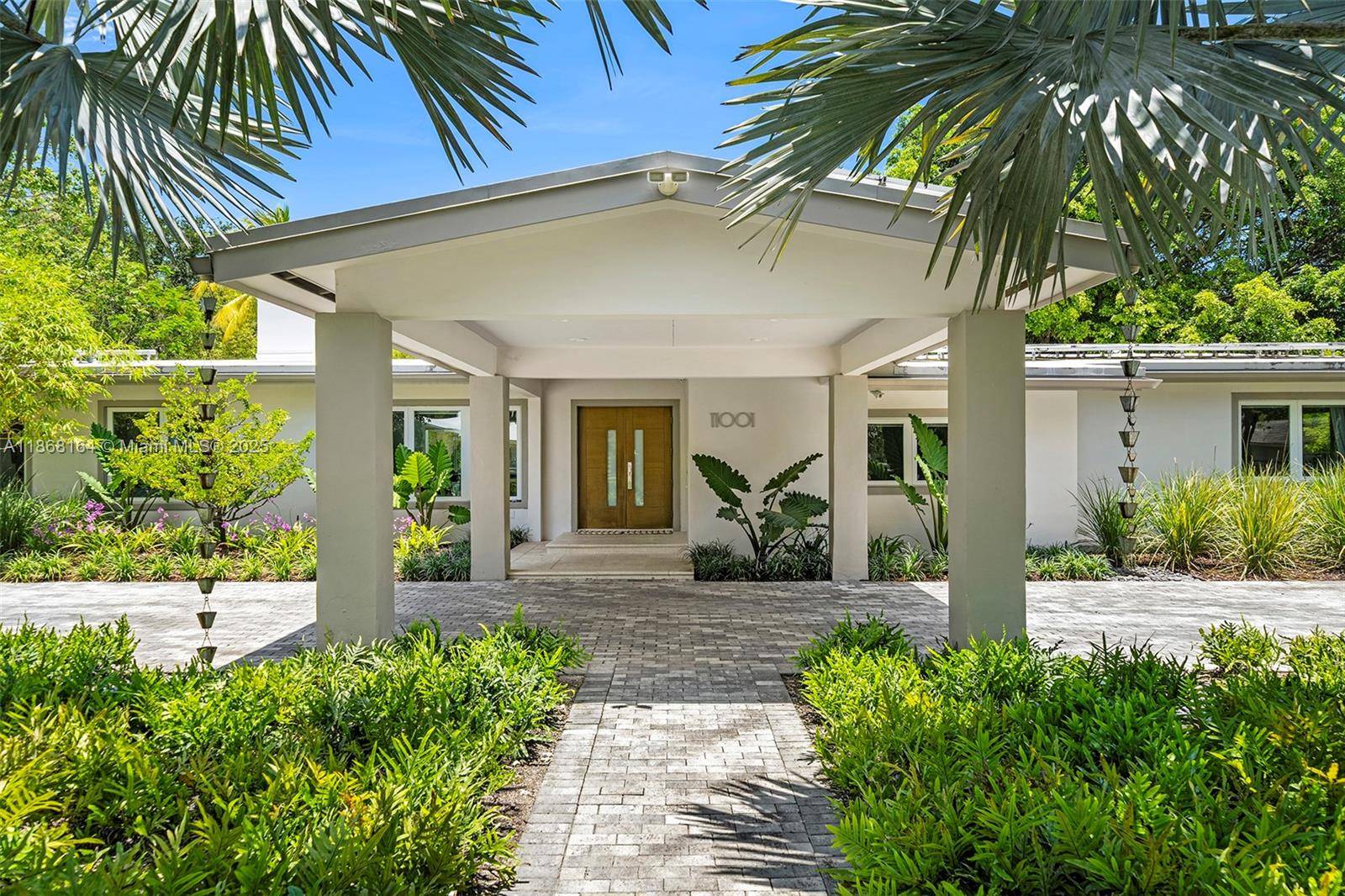 Positioned on a 34, 000 SF corner lot in North Pinecrest, 11001 SW 64th Ave is a one story 4, 600 SF single family home with 5 beds and 4 ...