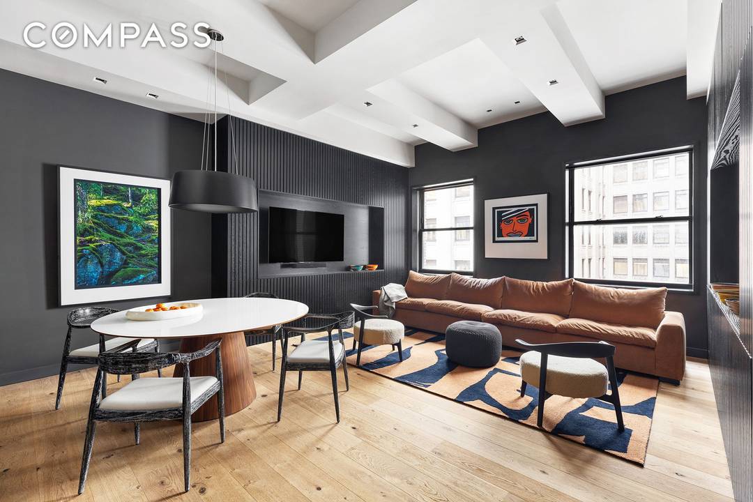 Stunning award winning designer renovated loft at iconic 20 Pine Street.