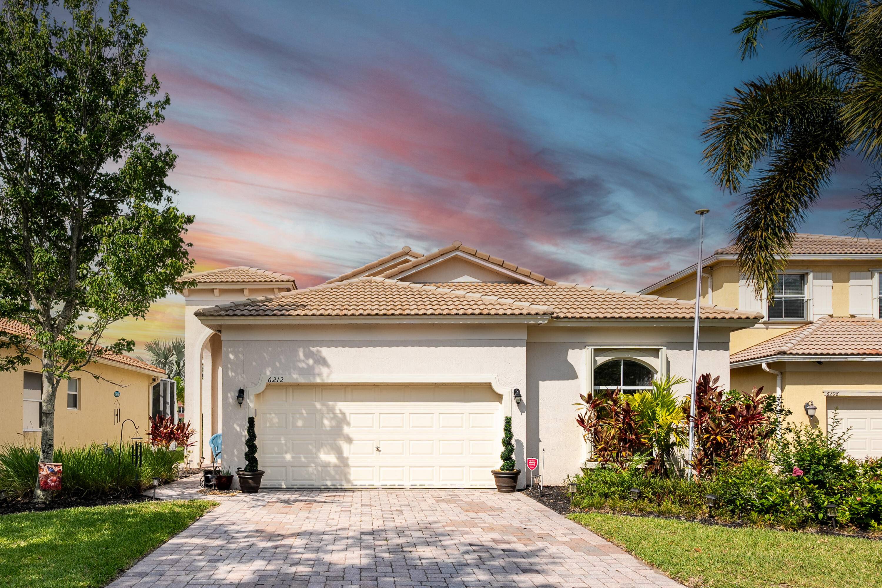 Brand New Roof ! Discover this Beautiful Three Bedroom Two BathroomLakefront home in Portofino Shores.