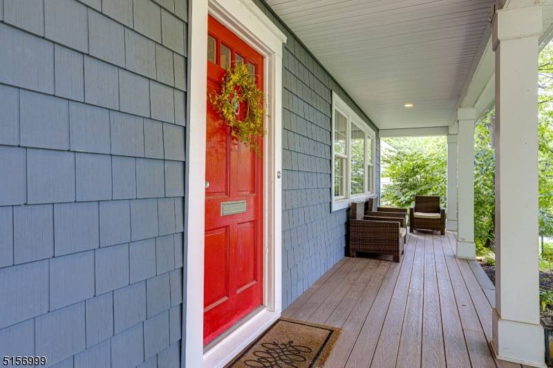 An inviting front porch welcomes you to this sun filled home, perfectly situated on a cul de sac in a desirable Murray Hill neighborhood.