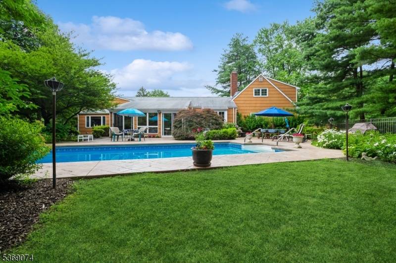 Beautifully appointed, and updated Shadow Oaks expanded ranch.