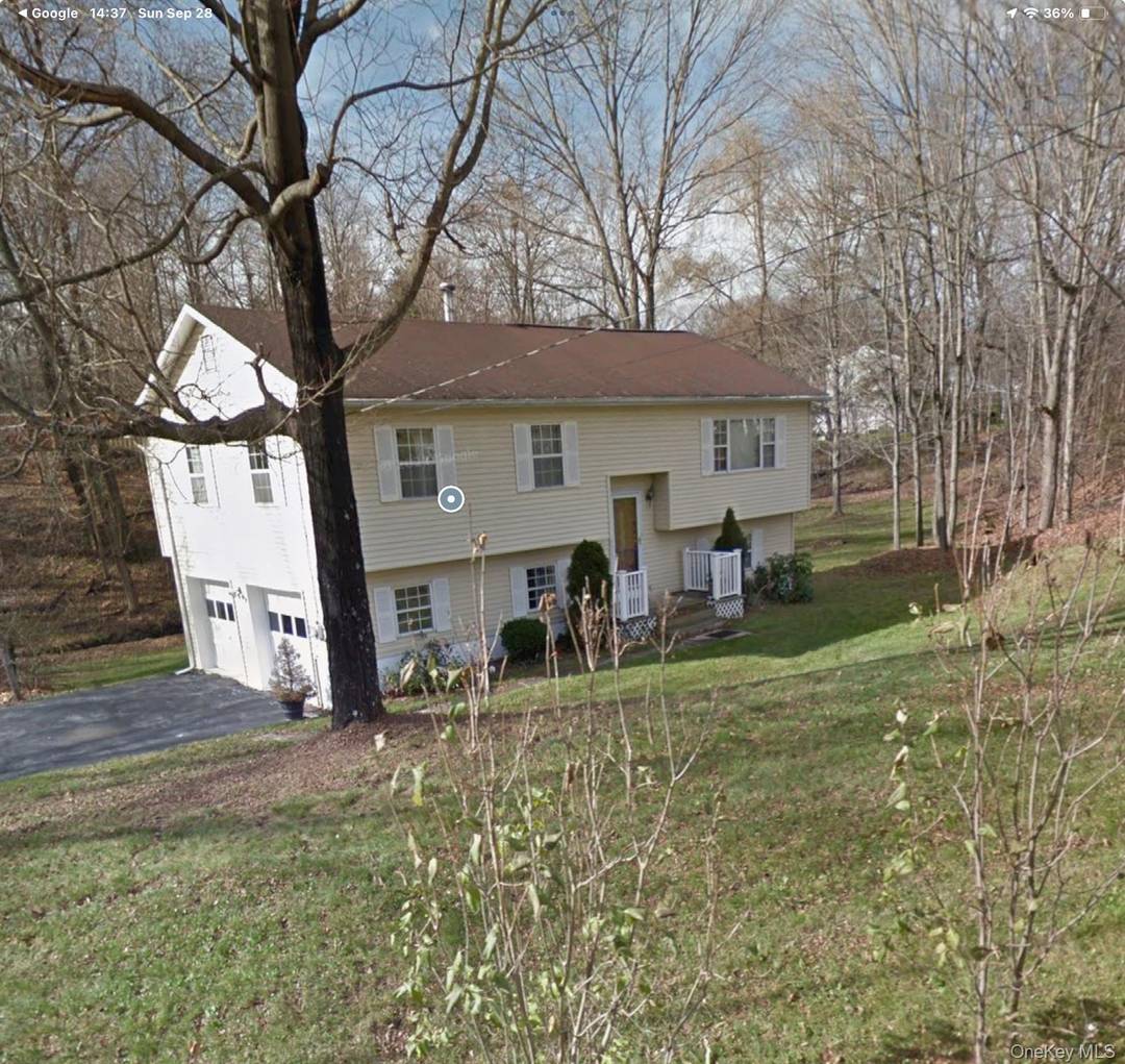 Nestled in the charming Beaver Dam Lake community, this split level house offers a fantastic expansion opportunity on a private 1.