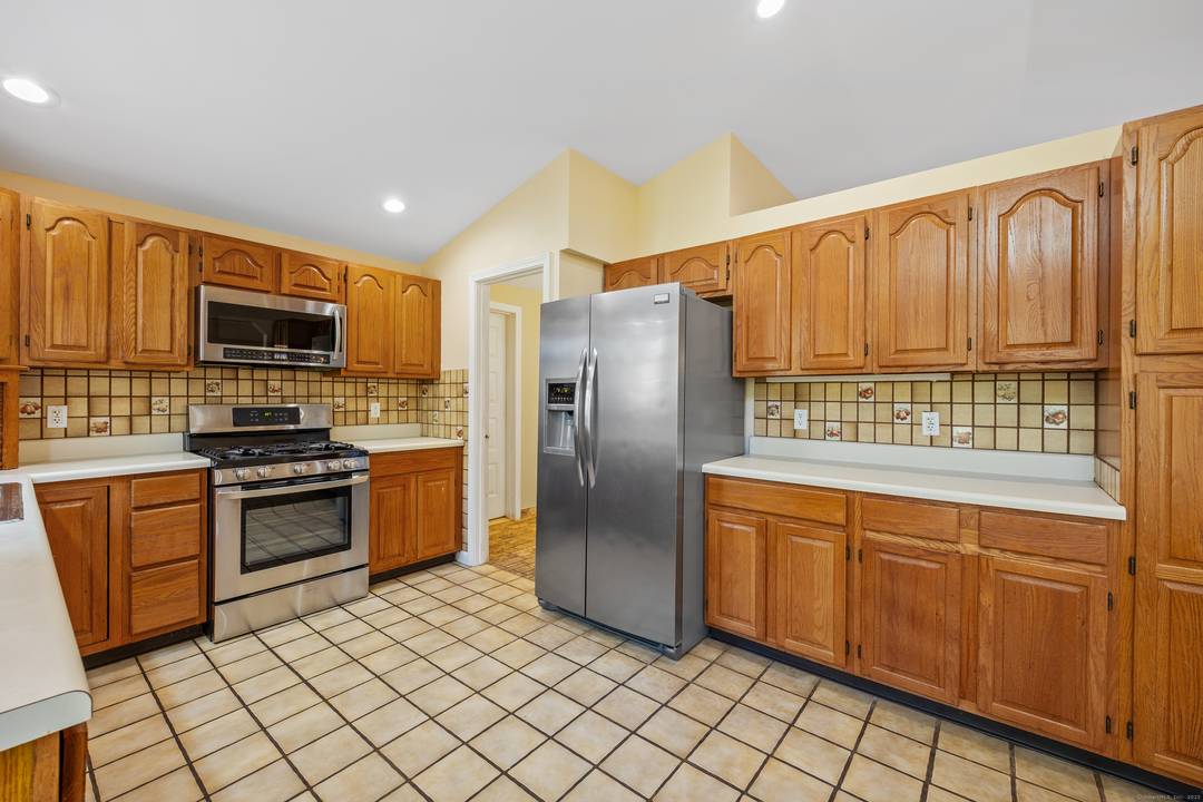 Step into this spacious 4 bedroom, 3 full and 2 half bath split level contemporary home offering over 2, 000 square feet of modern living space.