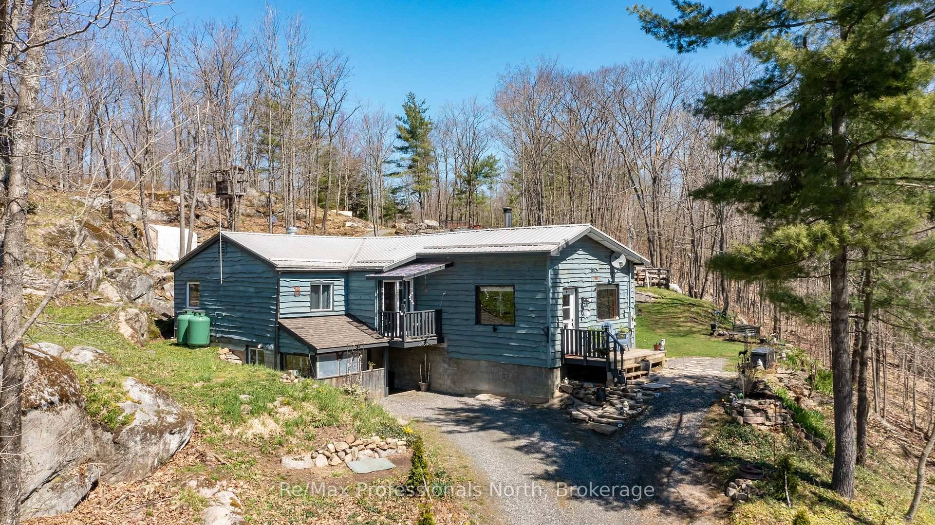 Charming updated bungalow on 35 acres of Muskoka wilderness !