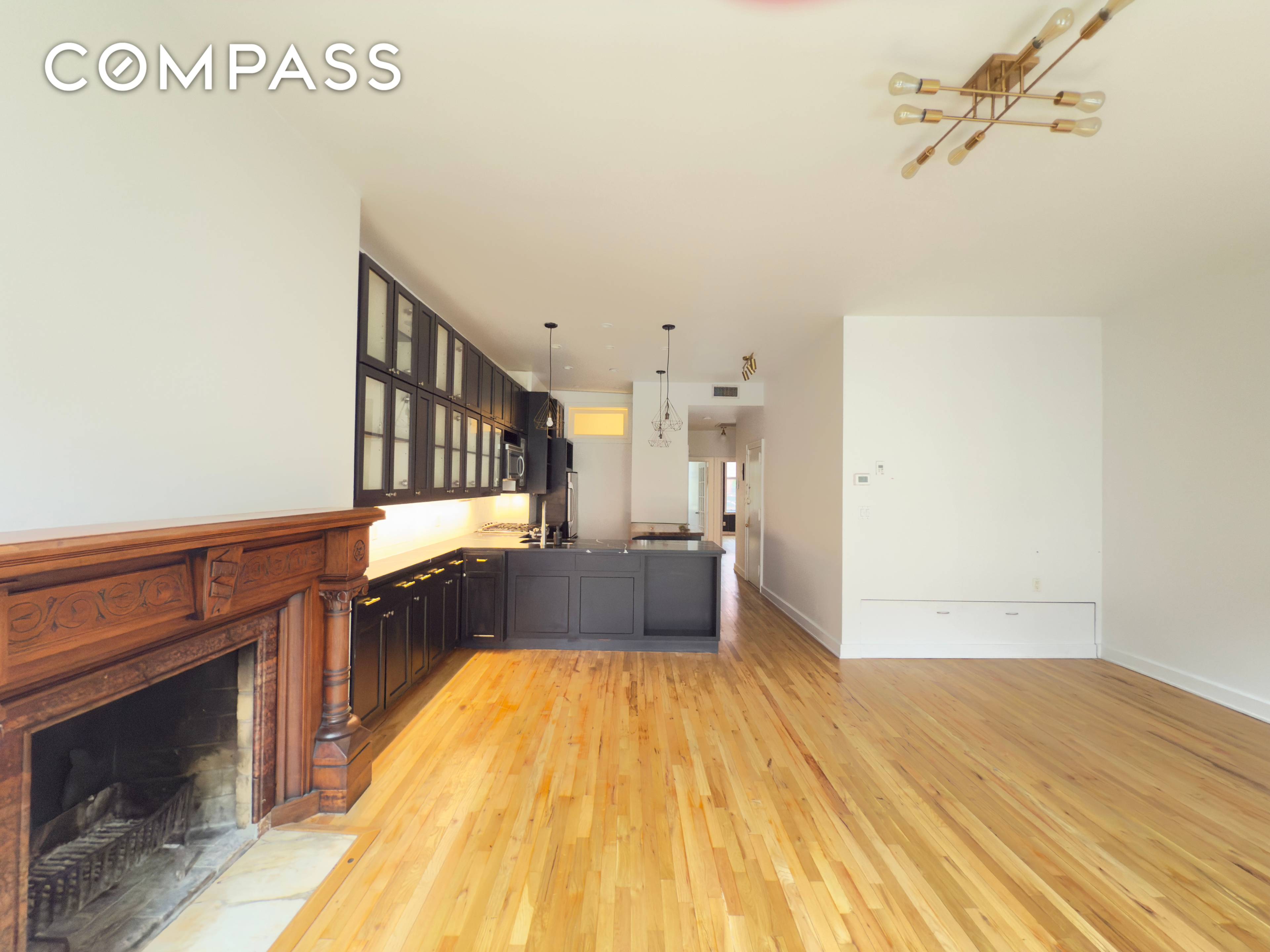 Wonderful Chelsea Floor through with 10 foot ceilings, two wood burning fireplace and a washer dryer !