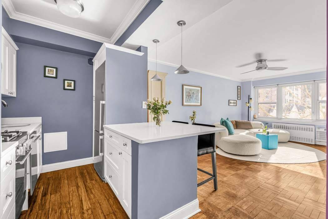 Sunny and happy home facing south over the gardens of the Schwab House on E 73 St.