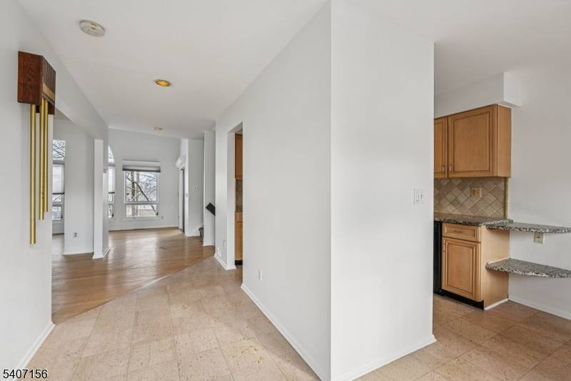 Welcome home to this beautiful and sunlit townhouse end unit.