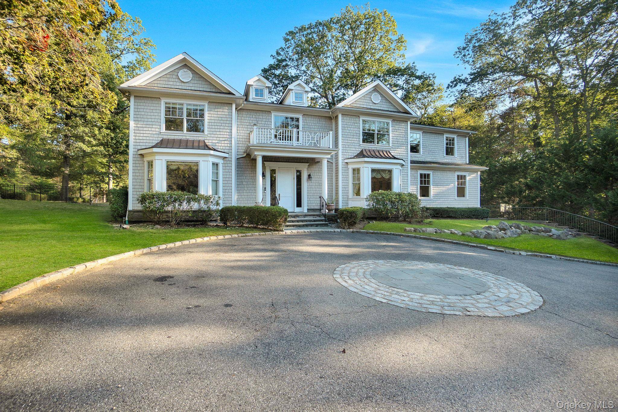 Welcome to 1 Norgate Rd. Discover elevated living in this gated Brookville estate, offering approximately 6, 200 sq ft of refined design and smart home innovation.