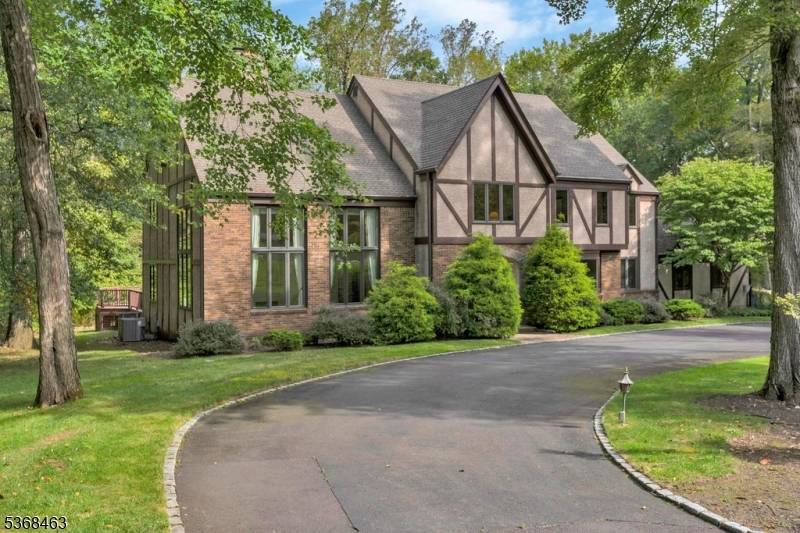 Welcome to 22 Crown Drive, a stately 5 bedroom, 3.
