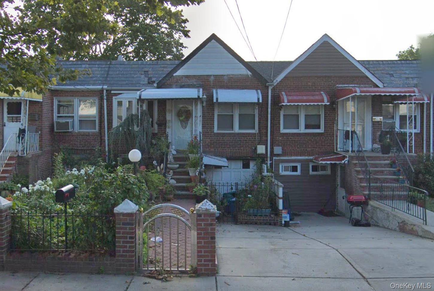 All Brick Legal 1 Family Currently Set Up As Mother Daughter Layout and Two Separate Entrances.