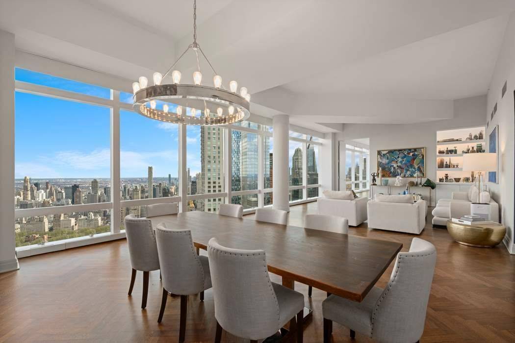 This dramatic transitional floor apartment is located high above Central Park on the 75th floor at 25 Columbus Circle.