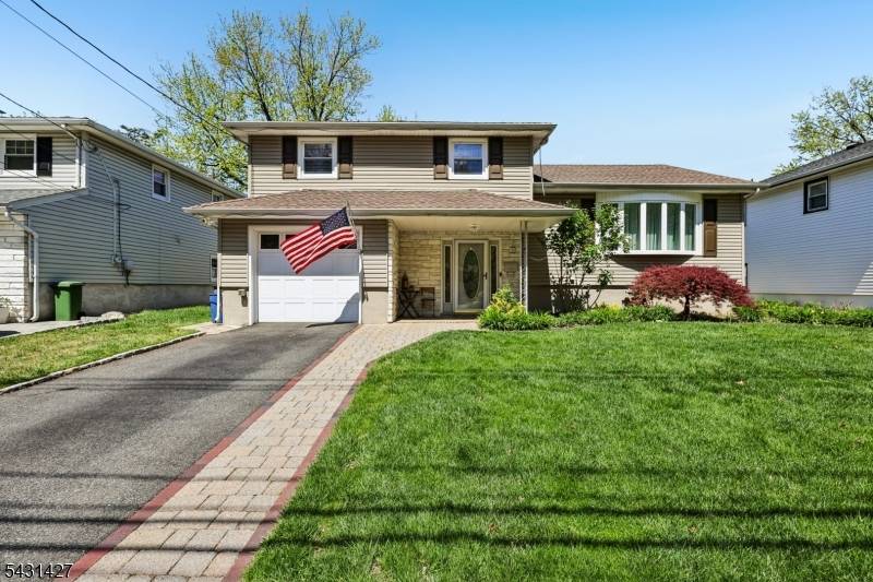 Charming Split Level Home in Desirable Oakview Section.