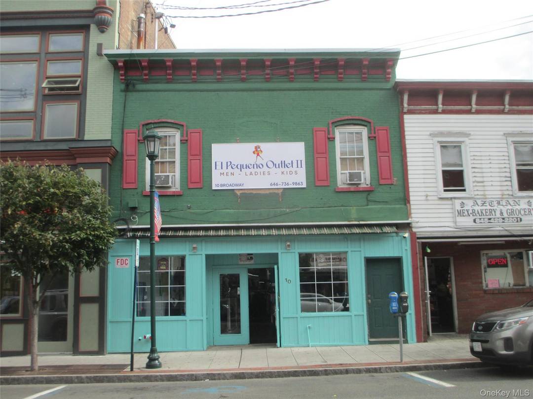 AAA LOCATION on BROADWAY in front of bus route !