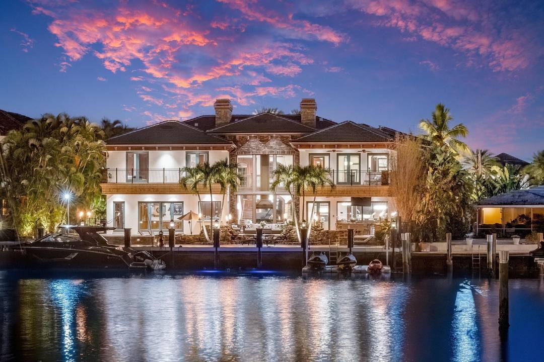 Introducing Villa Tremezzo, a privately gated West Coast Contemporary estate in Lighthouse Point's most prestigious enclave.