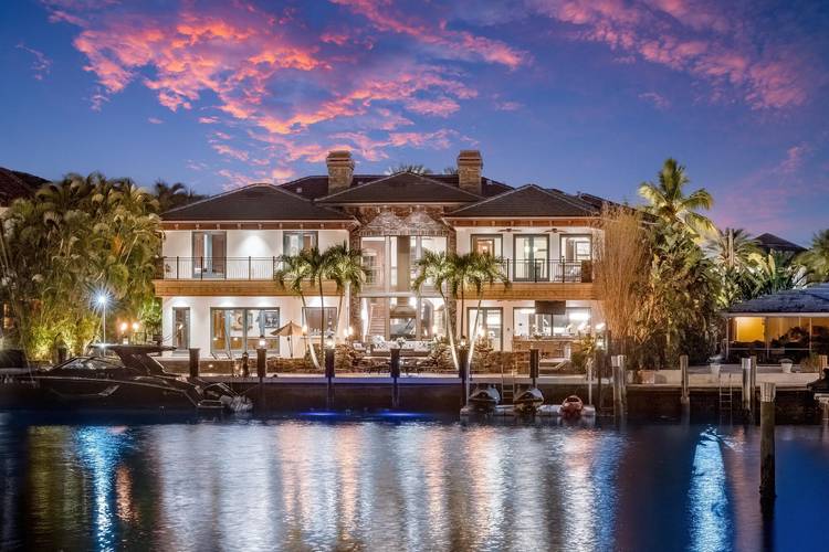 Introducing Villa Tremezzo, a privately gated West Coast Contemporary estate in Lighthouse Point's most prestigious enclave.