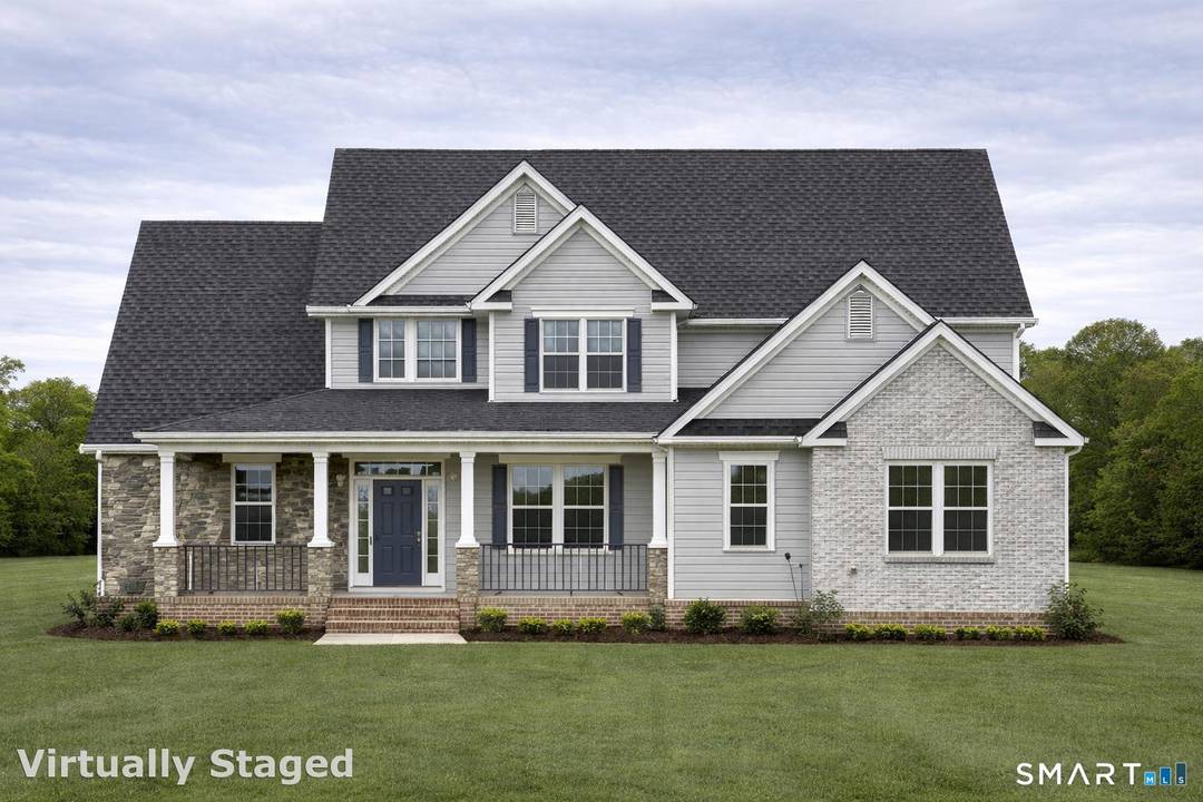 Nestled in the heart of Huntington Center, this exceptional new construction home offers a rare opportunity to own a custom built residence set on 1.
