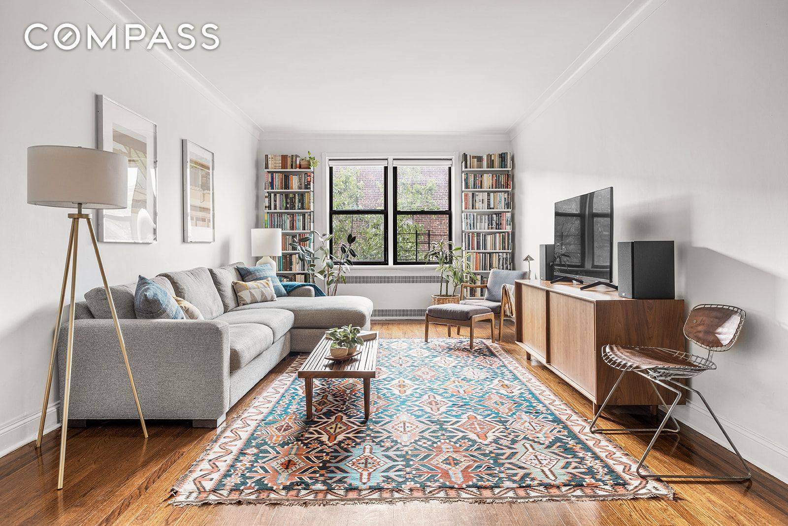 Prewar character meets contemporary style in this expansive two bedroom, one bathroom residence featuring an exceptional layout and move in ready interiors in a well heeled Jackson Heights cooperative.