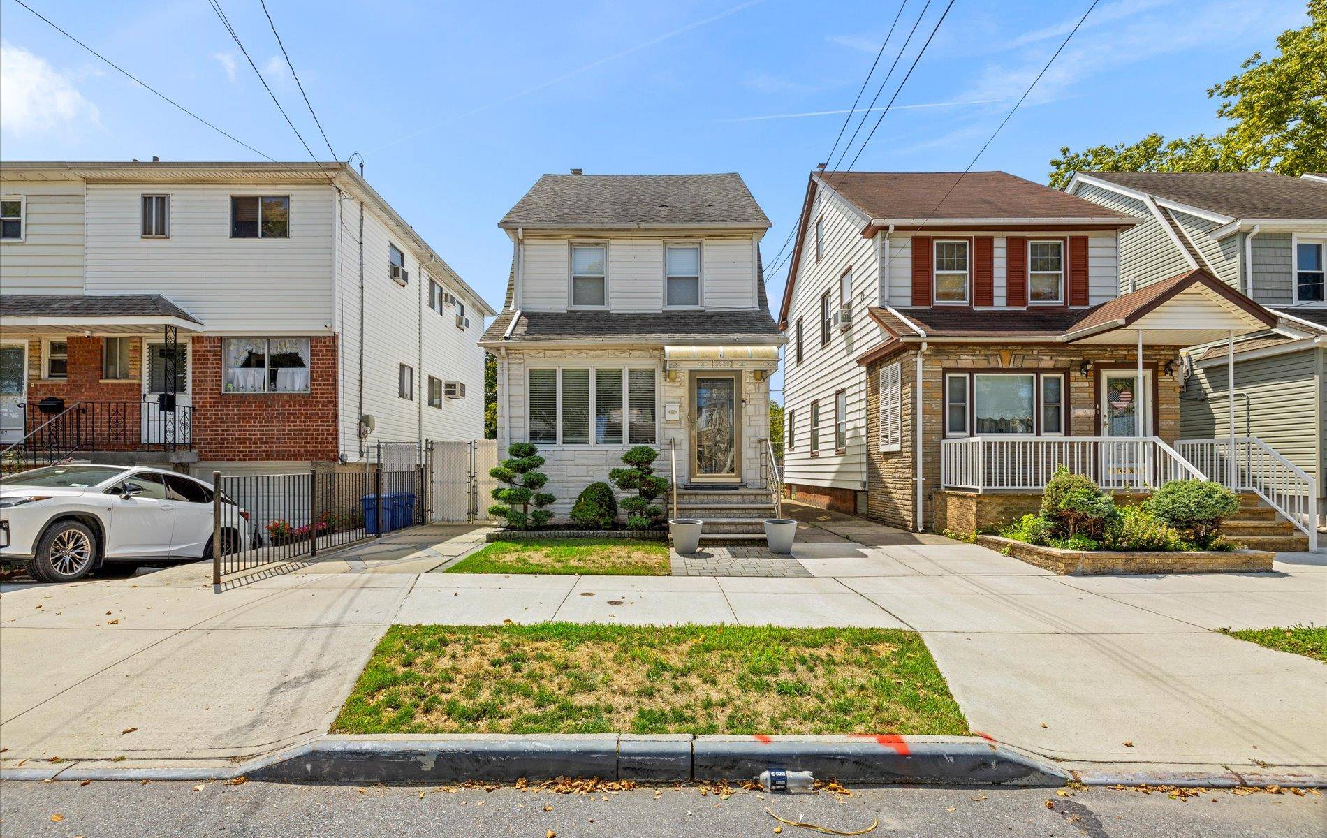 Welcome to 96 36 149th Avenue a true gem nestled in the heart of Ozone Park on an oversized lot !