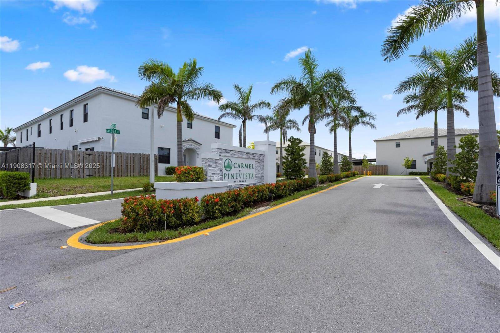 Beautiful 2023 townhouse located in Homestead, FL, featuring 4 bedrooms and a kitchen equipped with stainless steel appliances and a granite countertop.